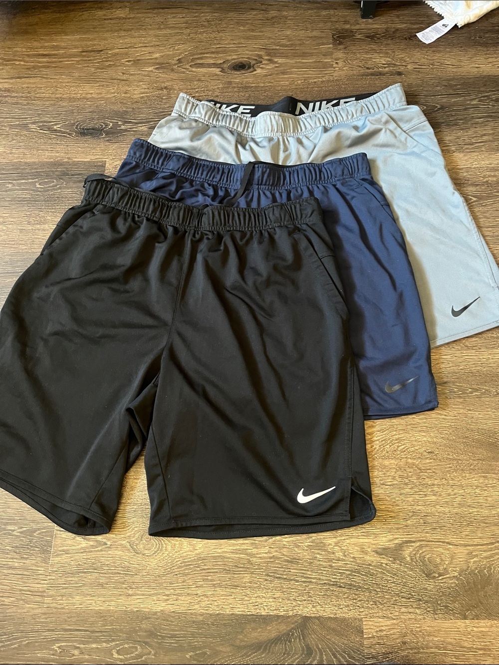 Three pairs Nike Men's Athletic Shorts - Black, Navy, Light Gray